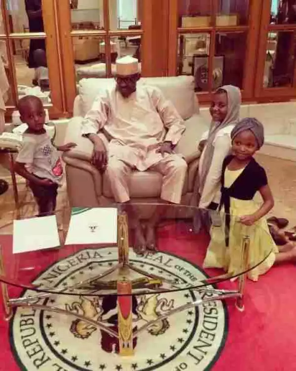 Cute Photo Of President Buhari With Some Young Members Of His Family